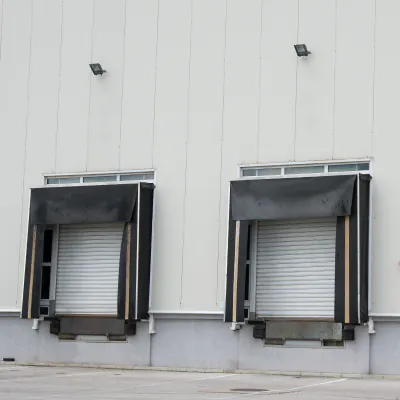 Garages for trucks lit by floodlights
